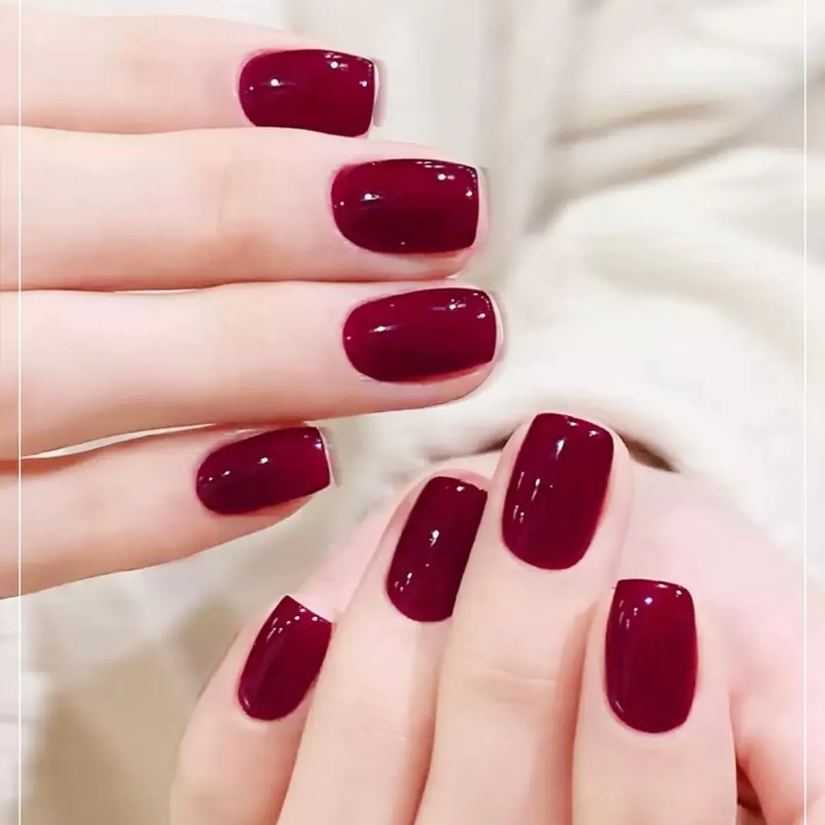 Crimson Luxe Gel Nail Wraps with a bold red finish, perfect for creating an elegant manicure at home.
