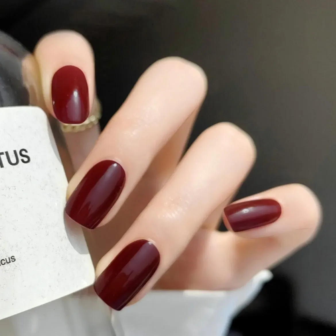 Deep Burgundy Gloss Gel Nail Wraps featuring a rich wine red shade and glossy finish for a timeless manicure.