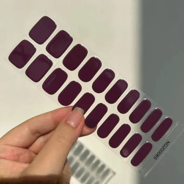 Deep Plum Gel Nail Wraps featuring a rich, dark purple shade for a sophisticated and luxurious manicure.