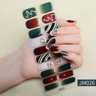 Christmas nail wraps featuring festive designs with Santa Claus, Christmas trees, and red, green, and white holiday colors.