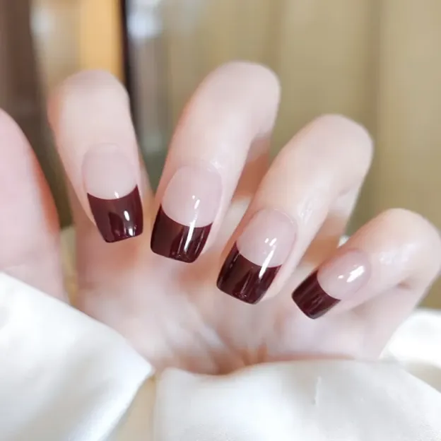 Elegant Burgundy French Tip Gel Nail Wraps featuring a rich burgundy hue and timeless French tip design.