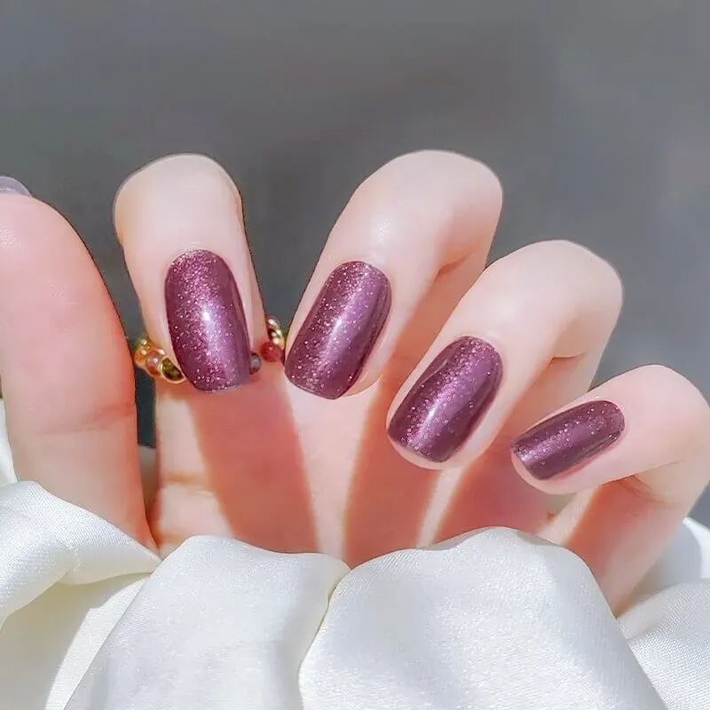 Elegant Wine Gel Nail Wraps with a shimmering burgundy finish, ideal for a timeless and luxurious manicure.