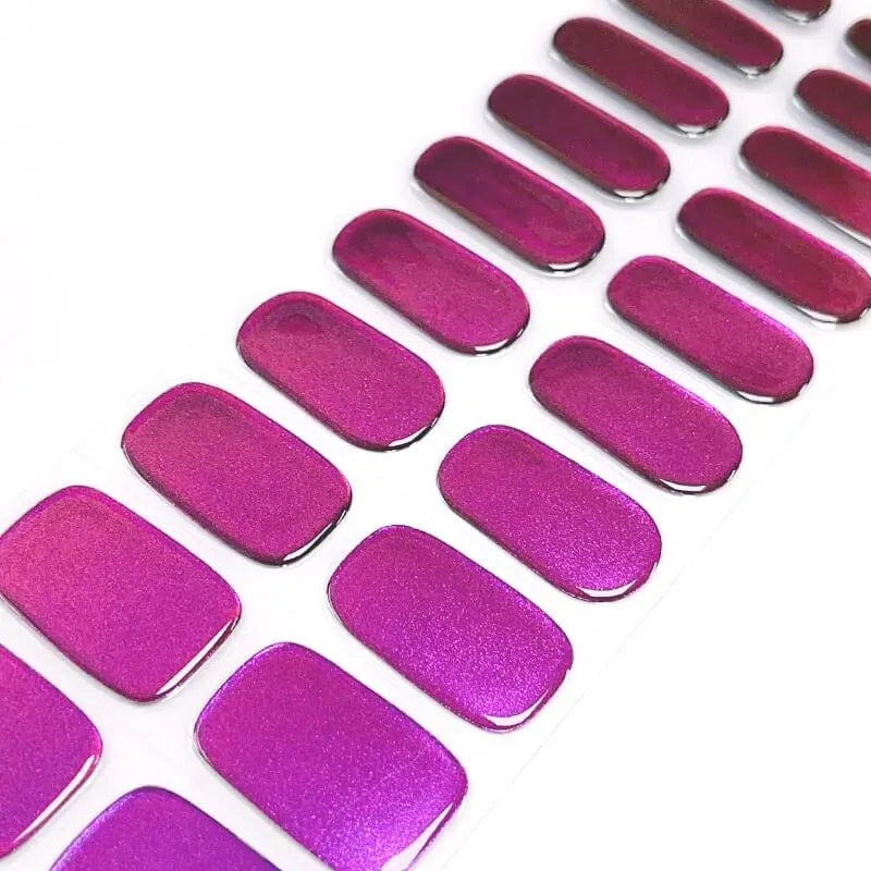 Fuchsia Radiance Gel Nail Wraps showcasing a bold metallic pink finish for a glamorous manicure.