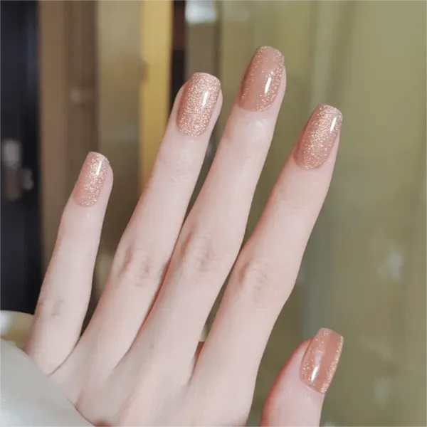 Golden Glow Glitter Gel Nail Wraps with a sparkling golden finish for a luxurious manicure.