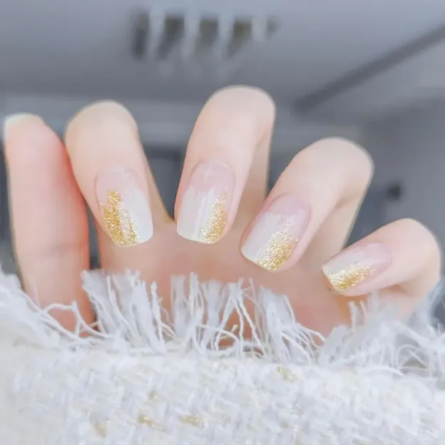 Golden Glitter Gradient Gel Nail Wraps featuring a sparkling and elegant gradient design for chic manicures.
