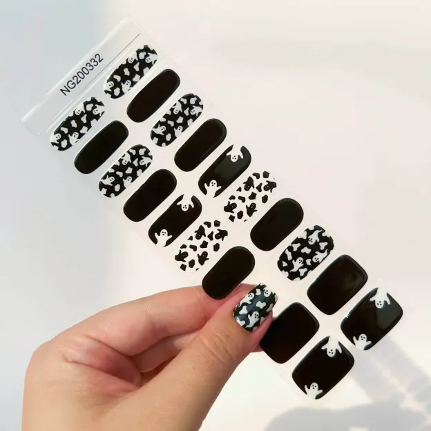 Halloween Ghost Gel Nail Wraps featuring spooky ghost designs on a black and white background, perfect for a stylish Halloween manicure.