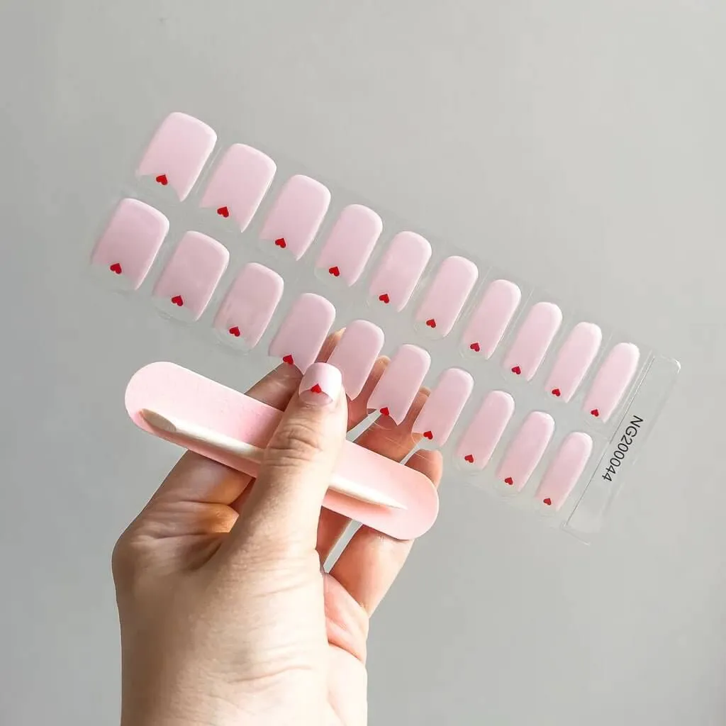 Heart Accent French Gel Nail Wraps with minimalist red heart design, perfect for romantic occasions.