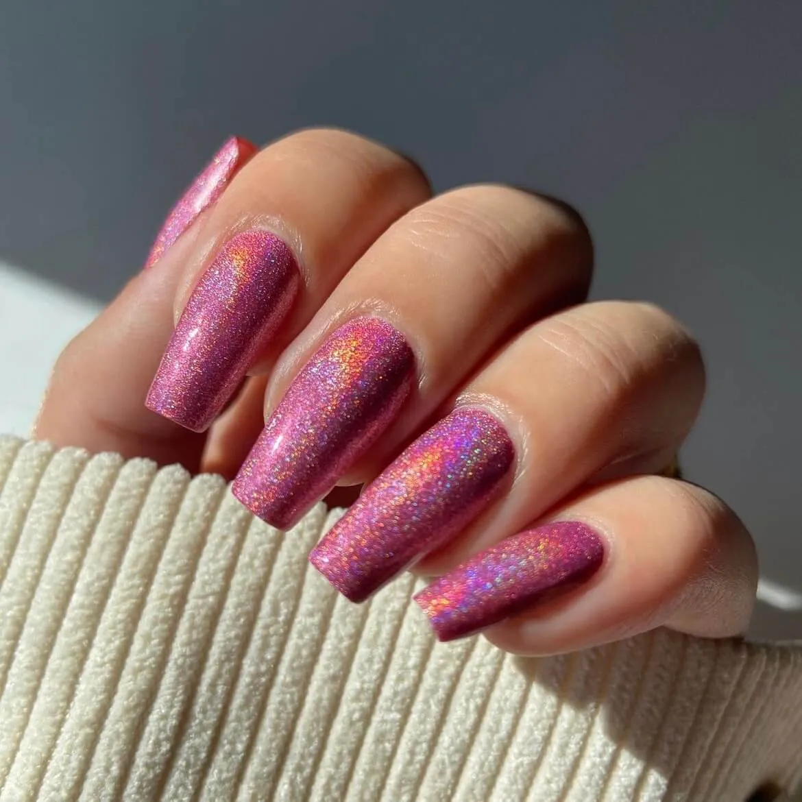 Shimmering Holographic Pink Gel Nail Wraps for a glamorous and glittery manicure.