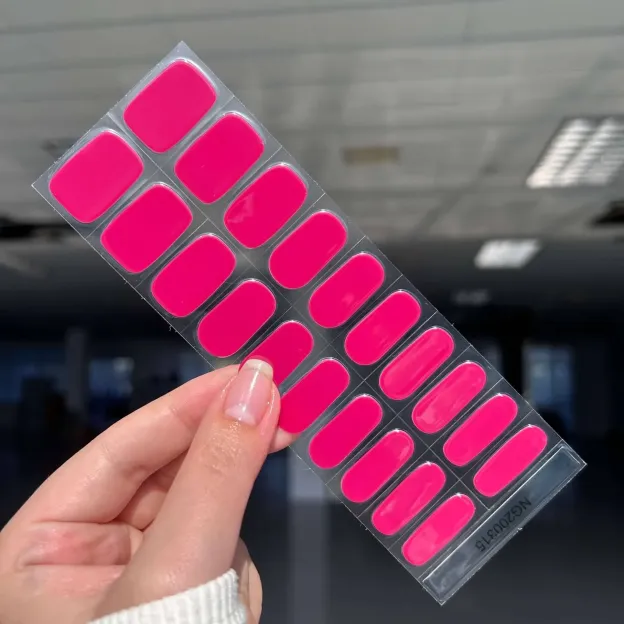 Hot pink gel nail wraps for a bold and vibrant manicure, perfect for any occasion.