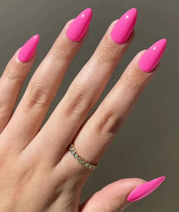 Hot pink gel nail wraps with a glossy finish for bold and vibrant nails.