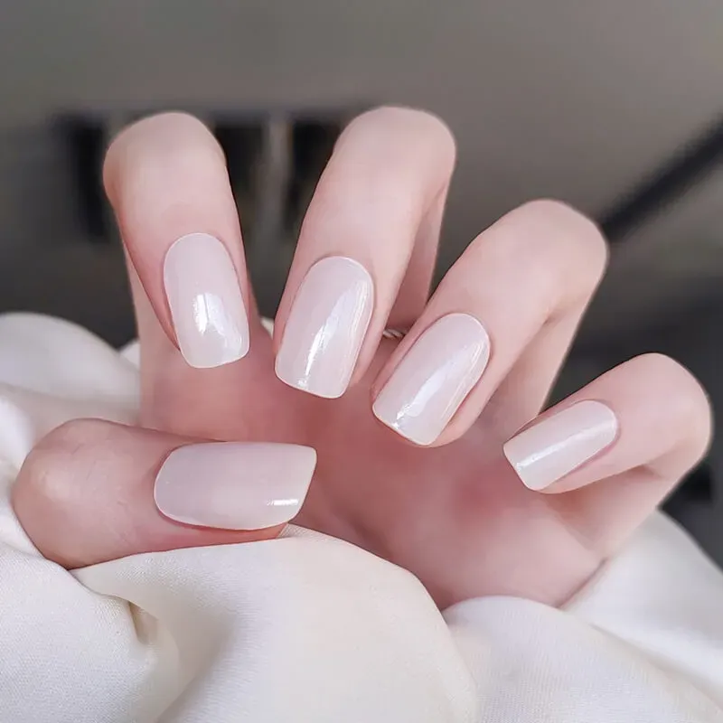 Ivory Elegance Gel Nail Wraps with a soft shimmer finish for a sophisticated manicure.