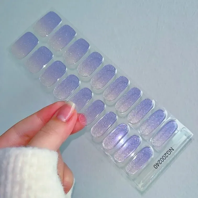 Lavender Glow Gel Nail Wraps showcasing a glittery lavender gradient for an elegant manicure.