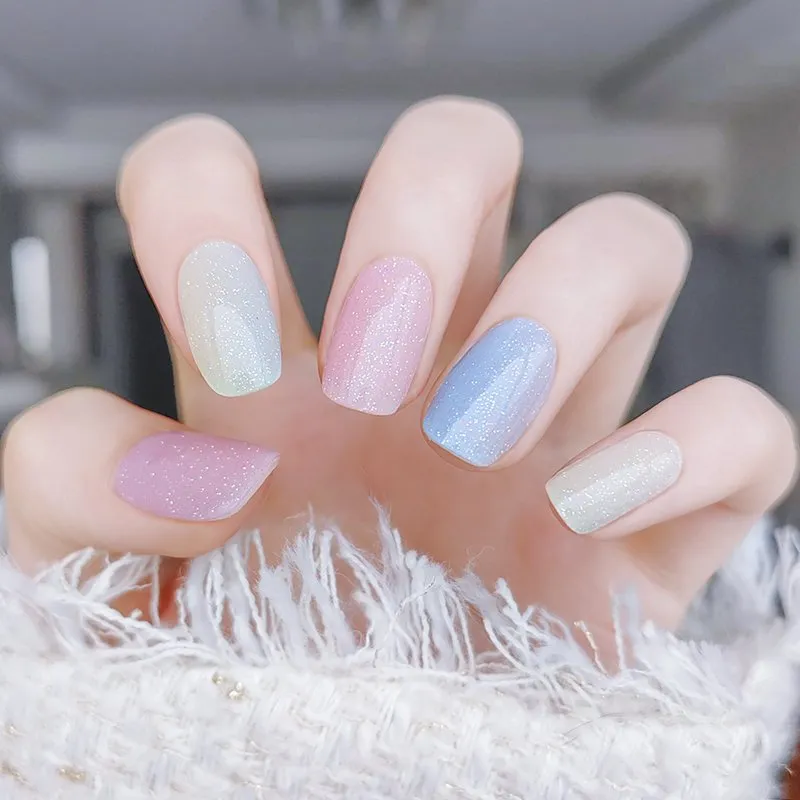 Pastel Gradient Gel Nail Wraps featuring a subtle blend of dreamy pastel colors with a glittering finish for an elegant and chic manicure.