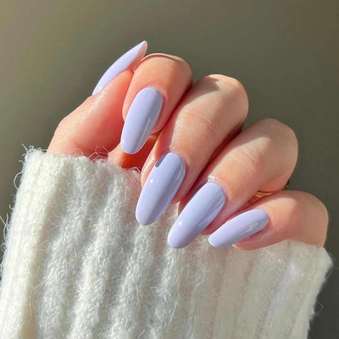 Pastel lavender gel nail wraps with a glossy light purple finish.