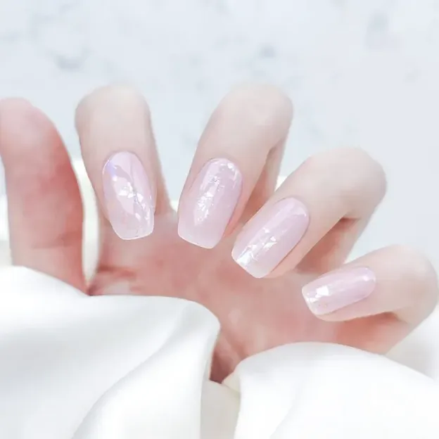 Pearl Pink Gloss Gel Nail Wraps showcasing a soft and glossy finish for a timeless manicure.