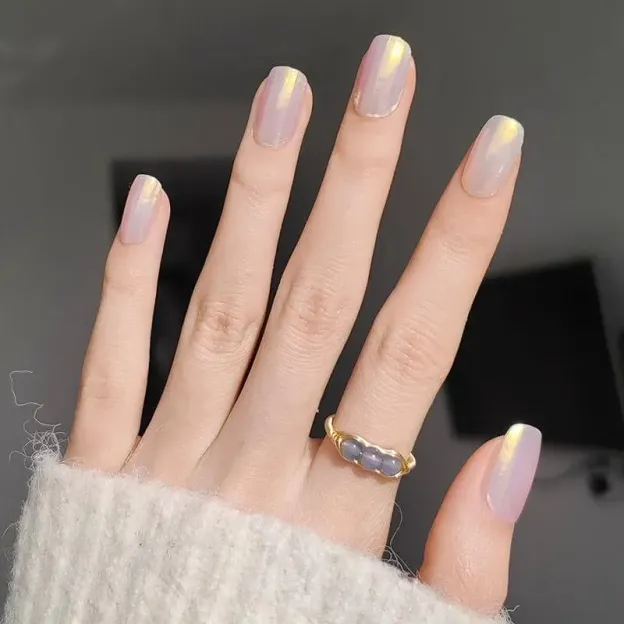 Pearlescent Glow Gel Nail Wraps featuring a luminous shimmer finish, perfect for an elegant manicure.