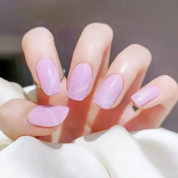 Pink Glow Gel Nail Wraps with a shimmering pink finish, ideal for a glamorous and elegant manicure.