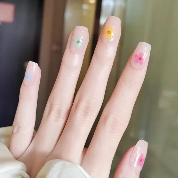 Playful Blossom Gel Nail Wraps with vibrant flower designs for cheerful spring nail art.