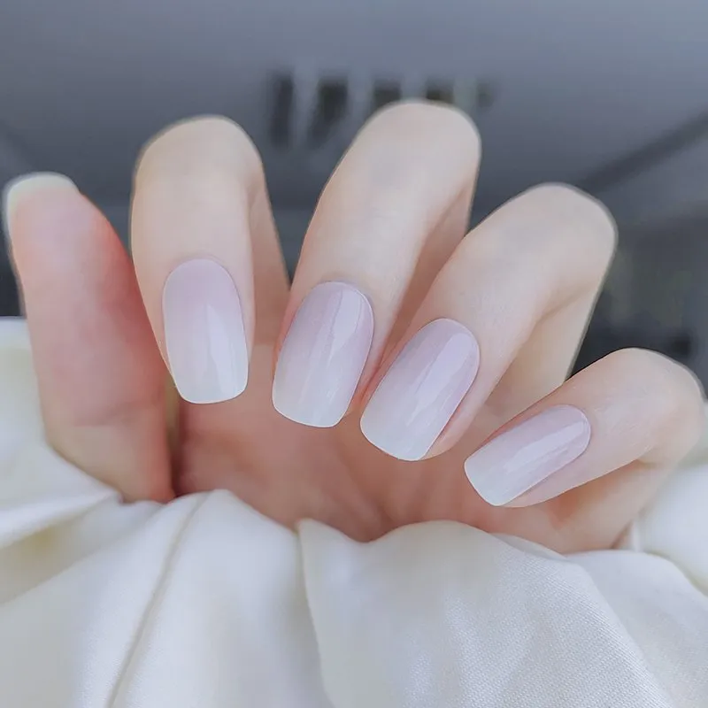 Pure Elegance Gel Nail Wraps showcasing soft nude tones for a minimalist and timeless manicure.