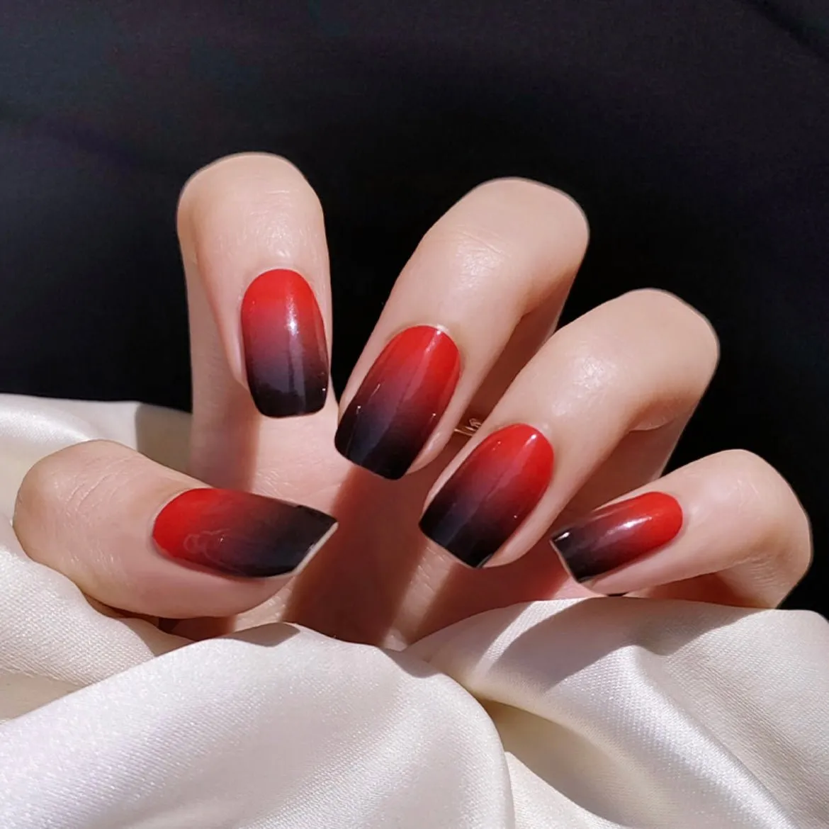 Red and Black Gradient Gel Nail Wraps showcasing a bold and elegant ombre manicure.