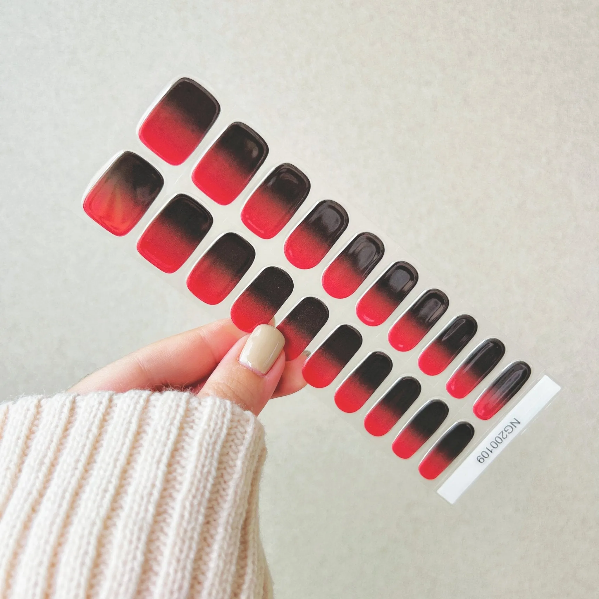 Red and Black Gradient Gel Nail Wraps showcasing a bold and elegant ombre manicure.