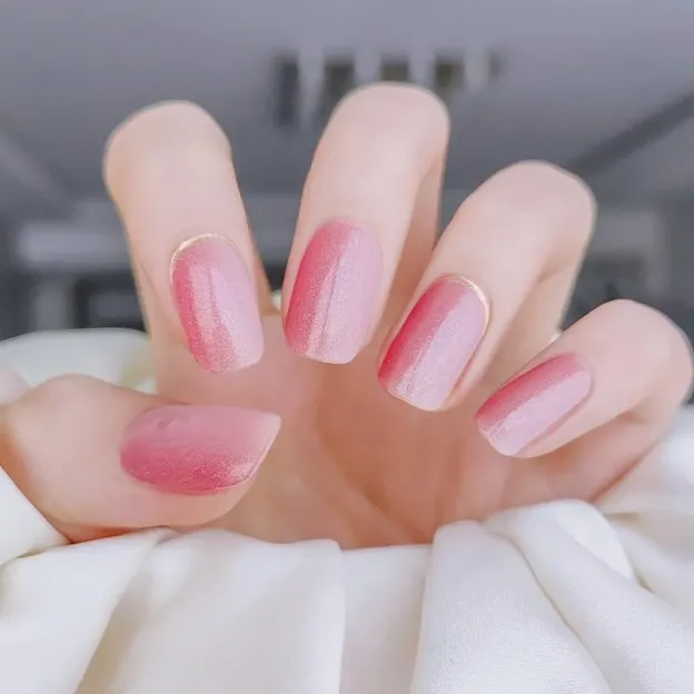 Rosy Glow Gel Nail Wraps featuring a gradient pink design with a shimmery finish for a feminine manicure.