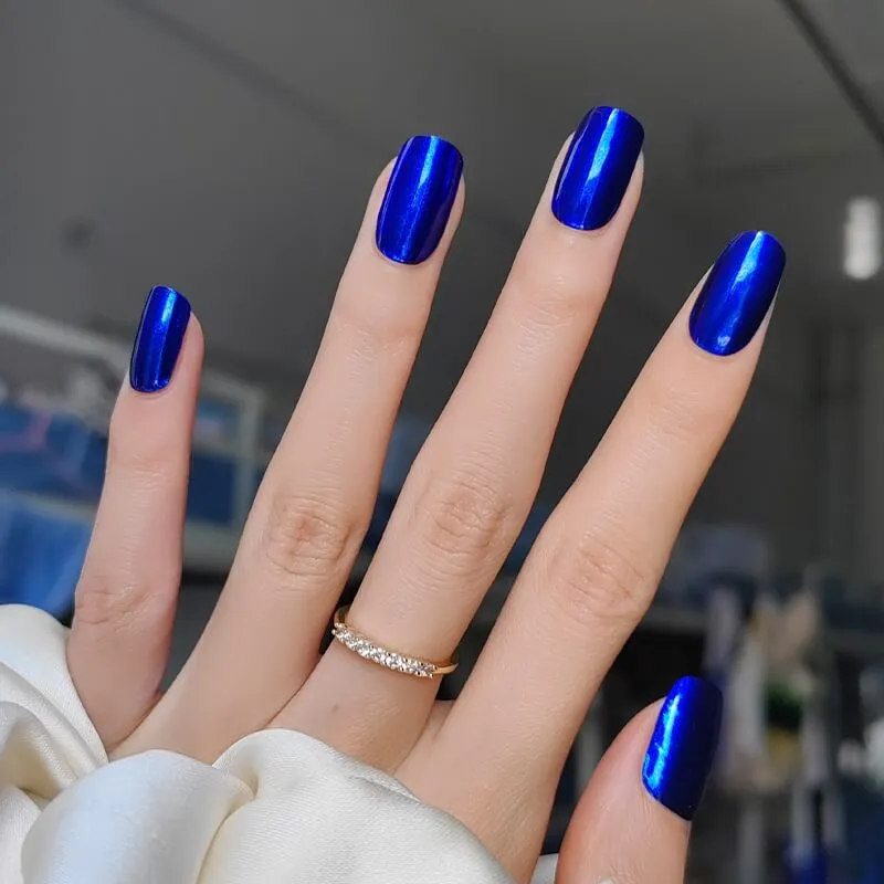 Royal Sapphire Gel Nail Wraps with a metallic blue finish for an elegant manicure.