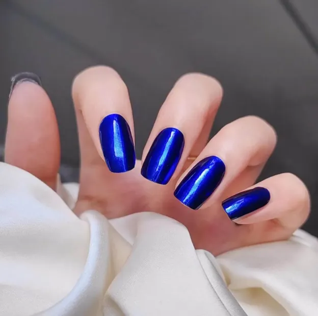 Royal Sapphire Gel Nail Wraps with a metallic blue finish for an elegant manicure.
