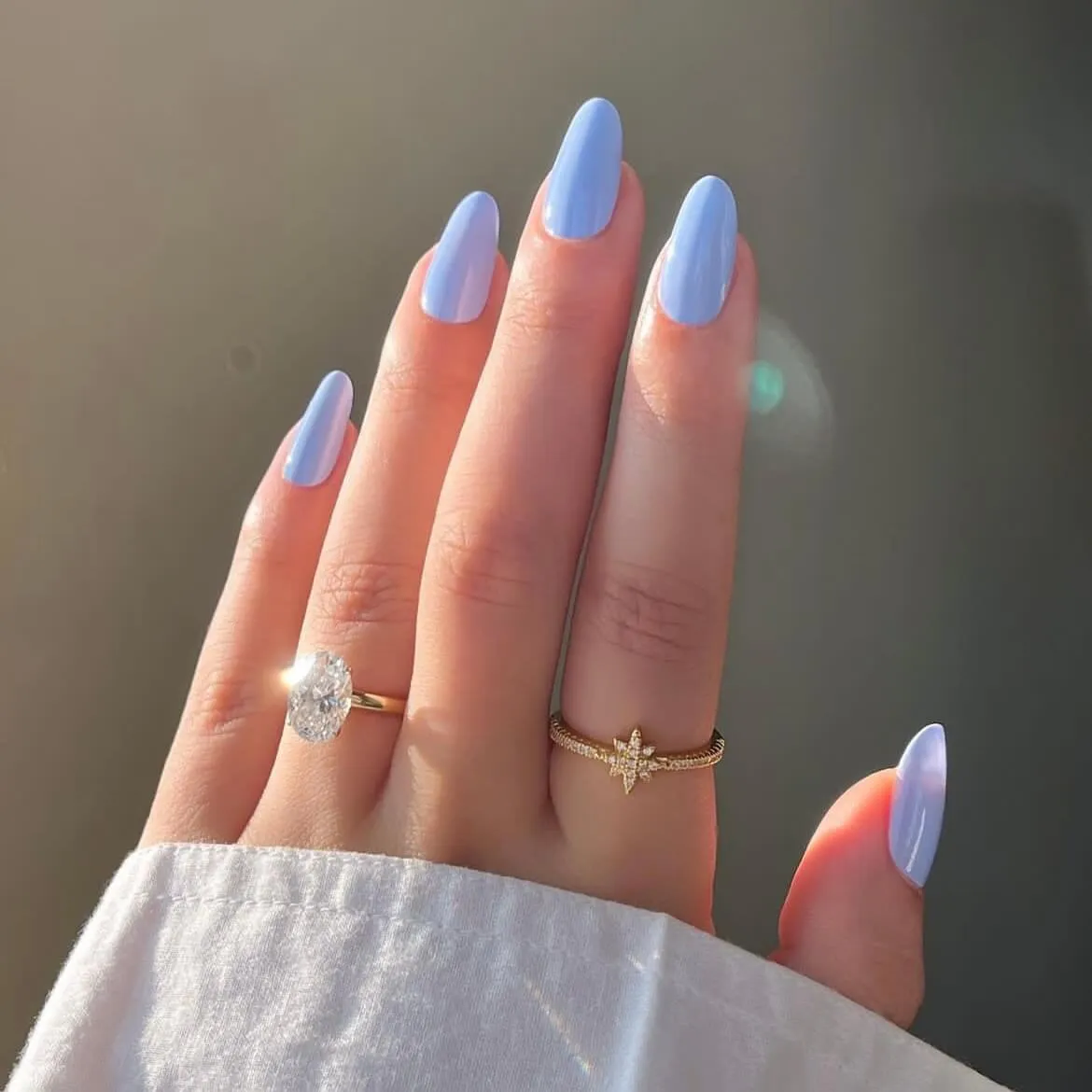 Pastel lavender gel nail wraps with a glossy light purple finish.