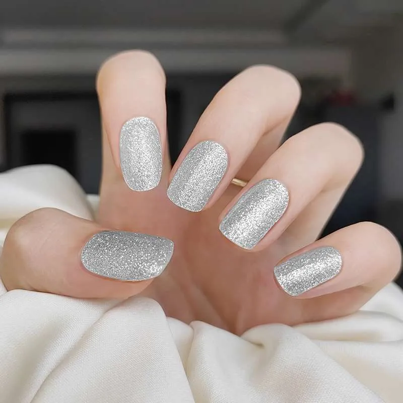 Silver Spark Gel Nail Wraps with dazzling glitter for a chic and glamorous look.