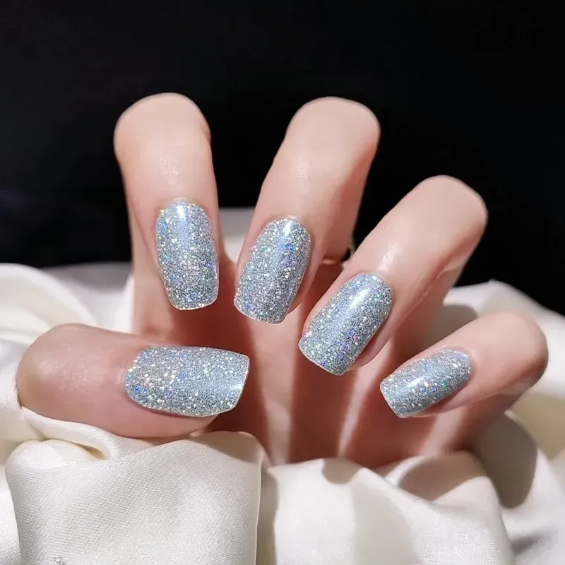 Silver Sparkle Gel Nail Wraps featuring a glittery silver finish, perfect for a glamorous manicure.