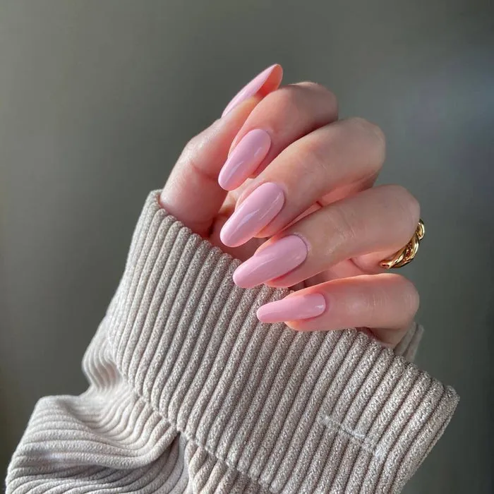 Soft pink gel nail wraps with a minimalist and natural finish, perfect for an elegant everyday look.