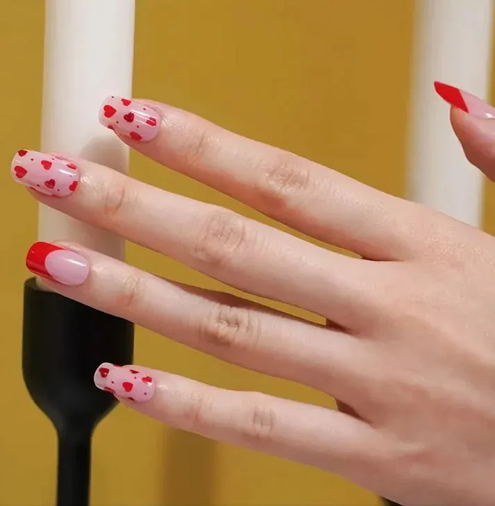Valentine's Love Heart Gel Nail Wraps featuring a romantic red and pink heart design for a perfect manicure.