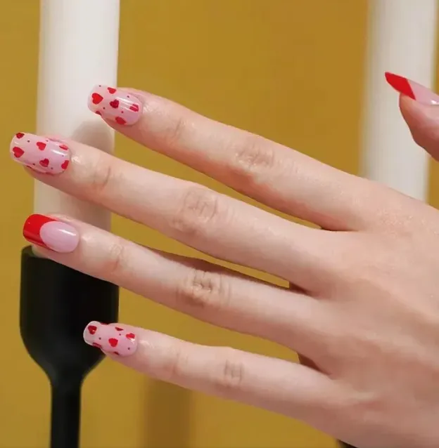 Valentine's Love Heart Gel Nail Wraps featuring a romantic red and pink heart design for a perfect manicure.