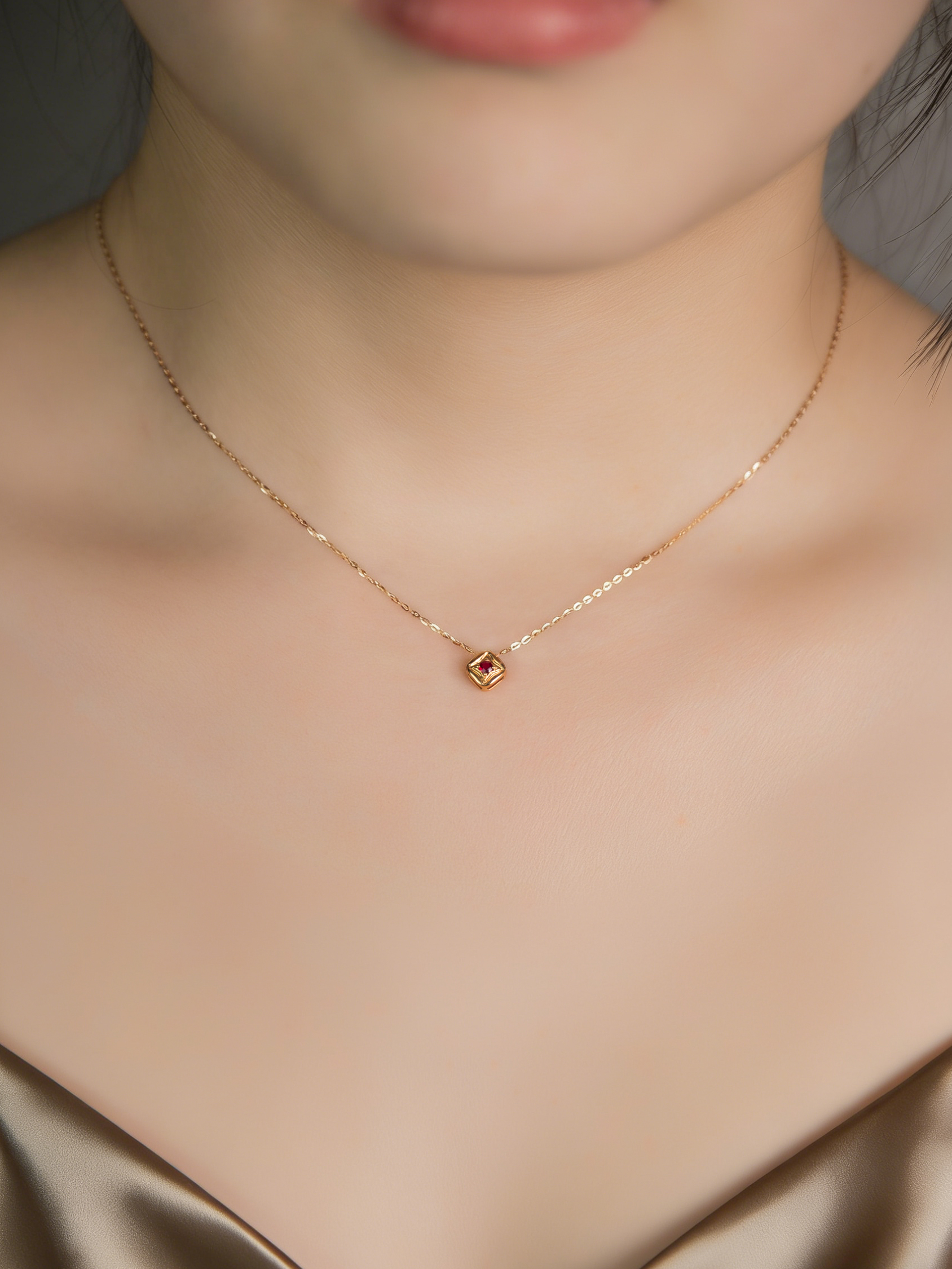 Ruby-embellished 18K rose gold necklace set, a symbol of enduring love.