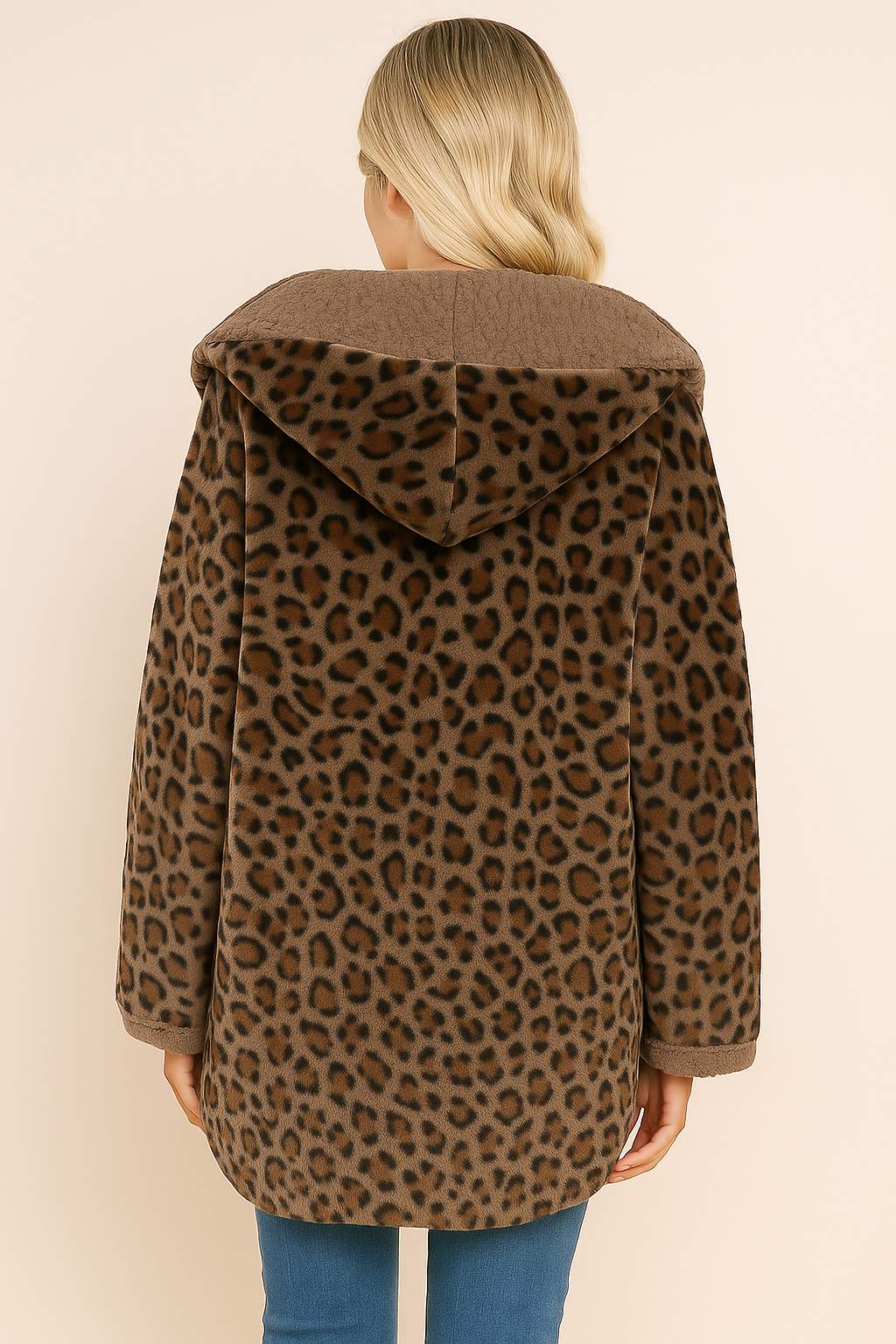 Back view of a burgundy leopard print hooded jacket with rounded hem.