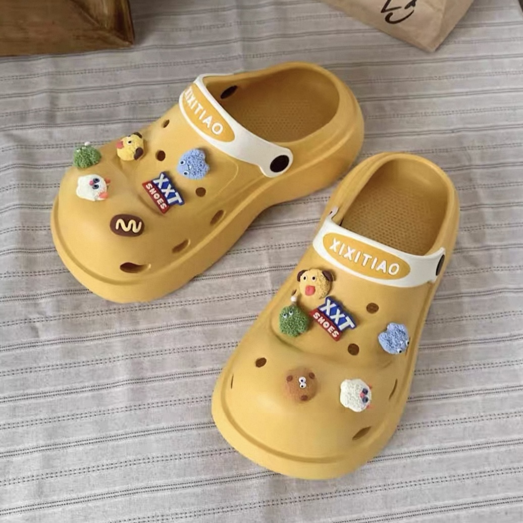 A456. CROCS MONSTER YELLOW