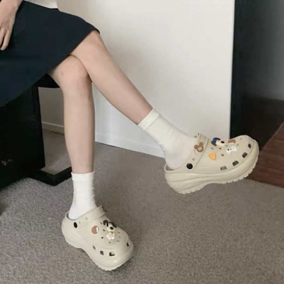 A474. CROCS PUPPY NUDE