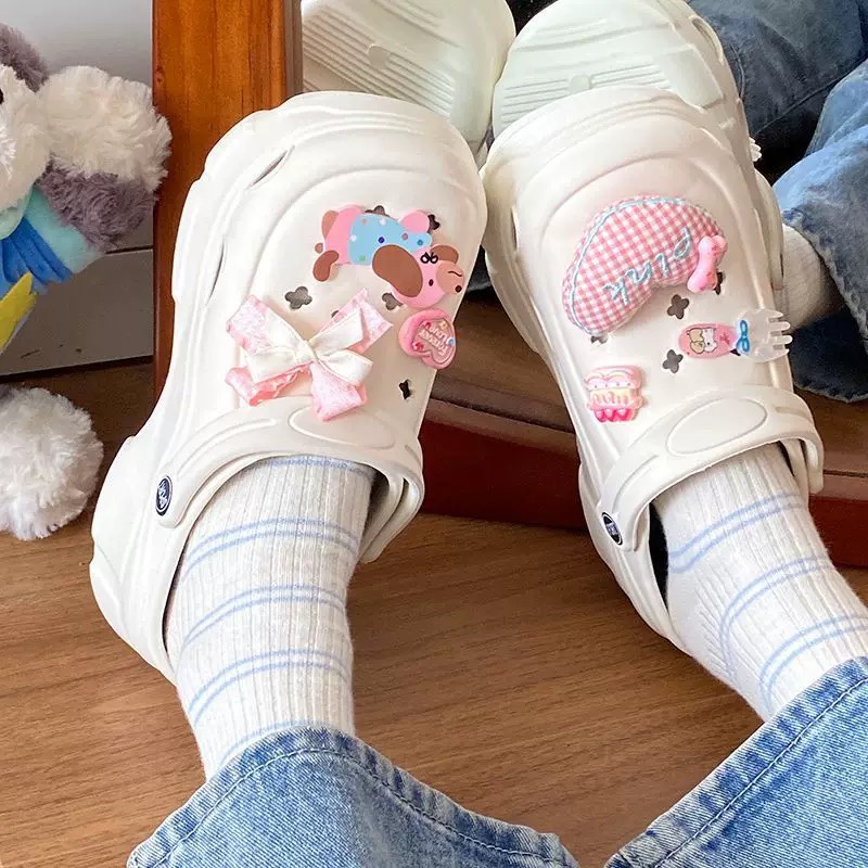 A501. CROCS PUPPY WHITE