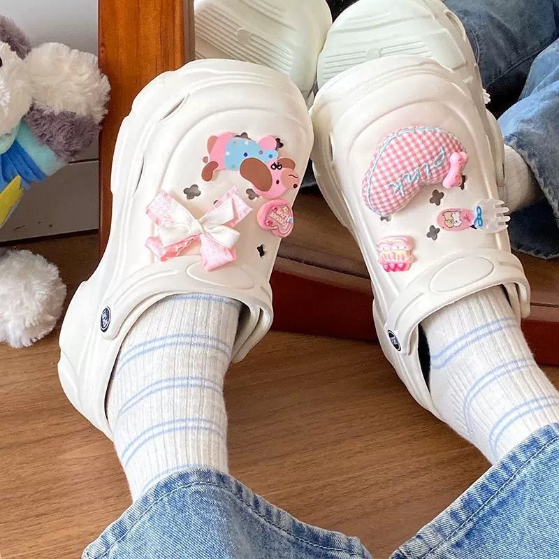 A501. CROCS PUPPY WHITE