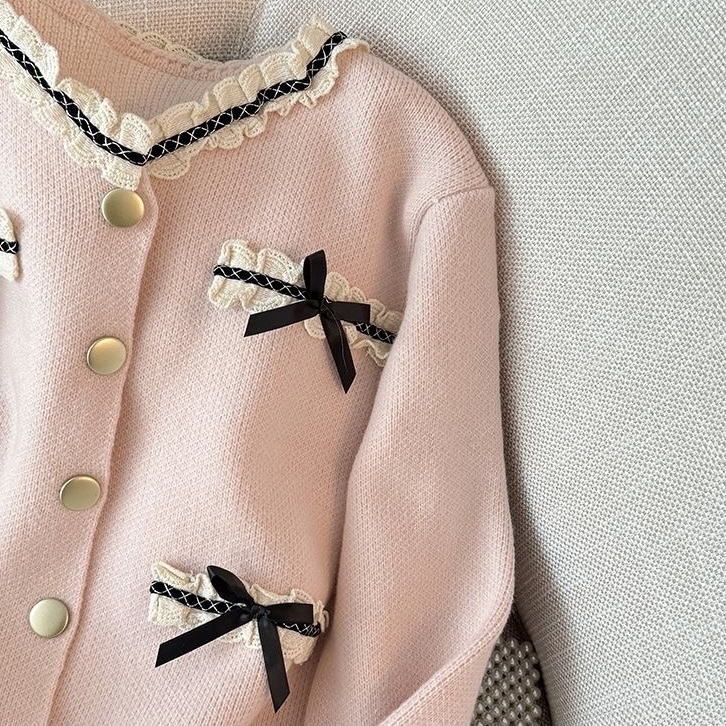 T344. CARDIGAN PINK BOWTIE