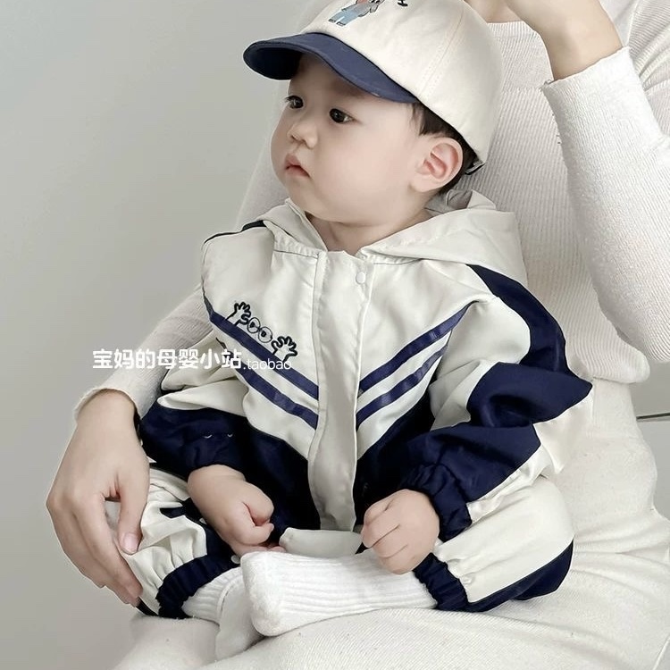 K79. WHITE BABY JUMPSUIT