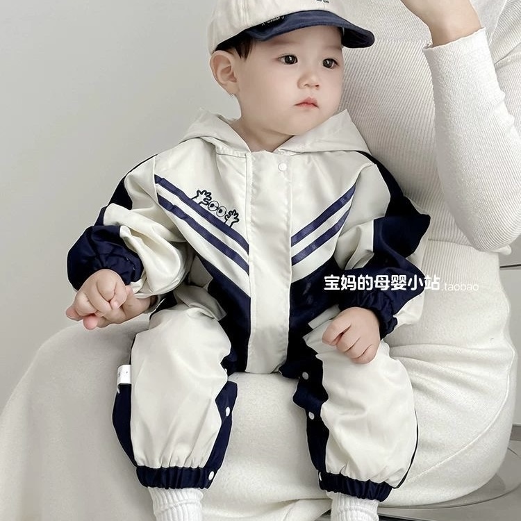 K79. WHITE BABY JUMPSUIT