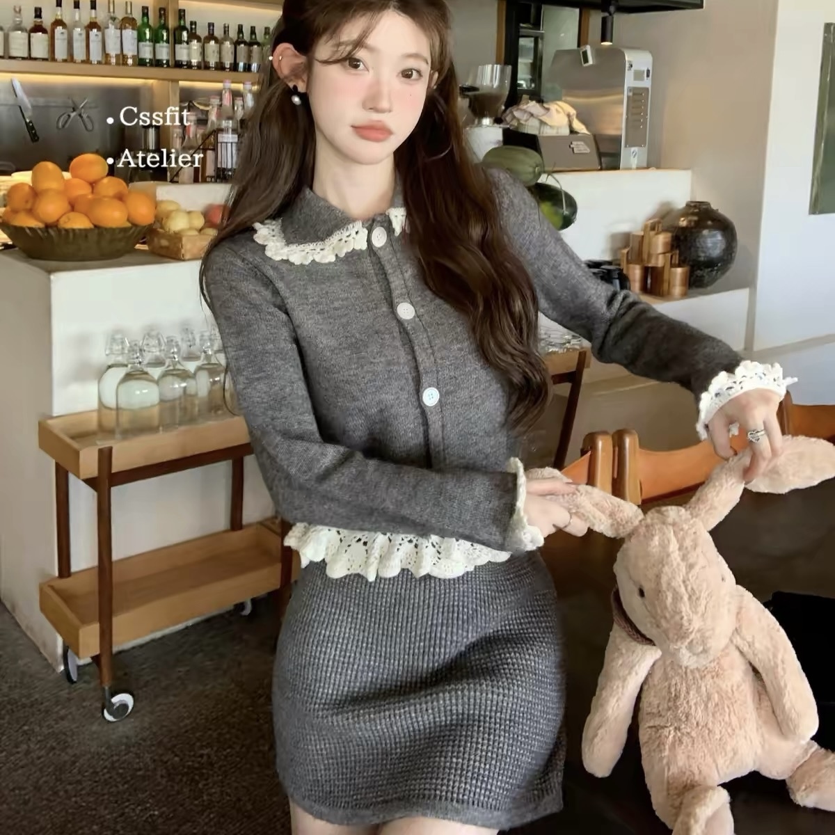 6877. SET SHORT SKIRT KNITTED GRAY