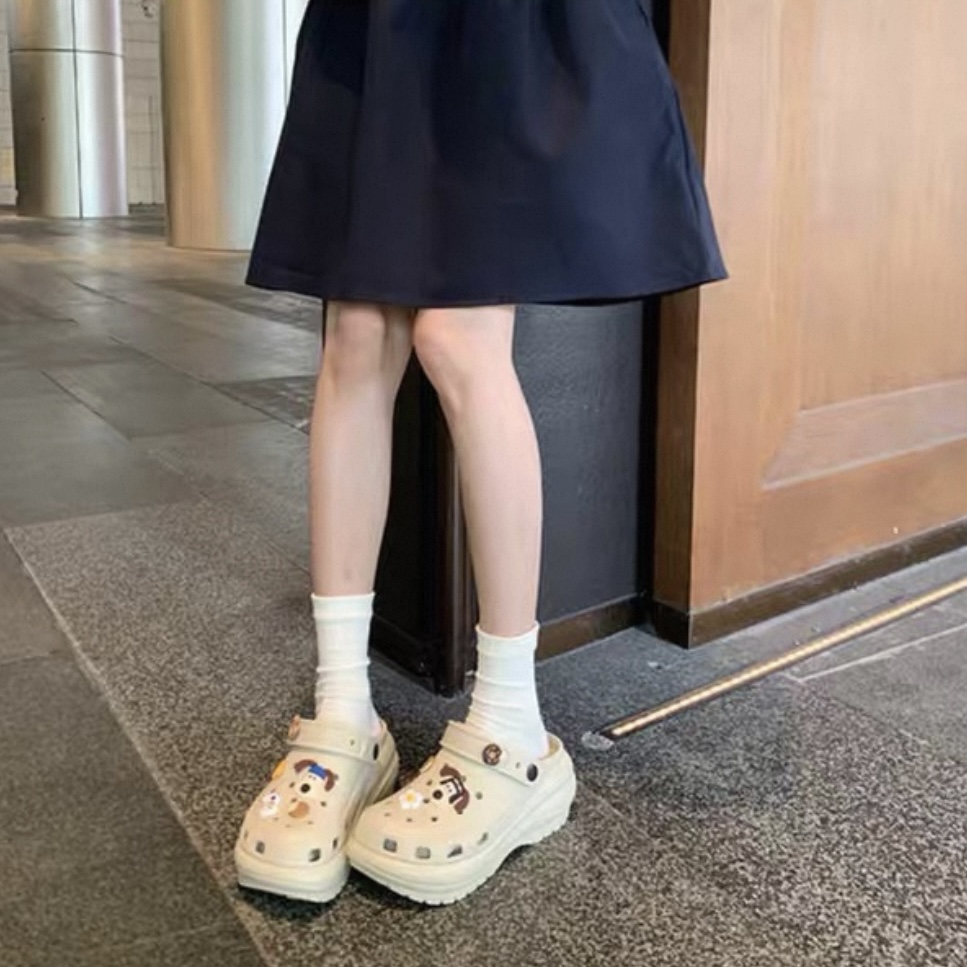 A474. CROCS PUPPY NUDE