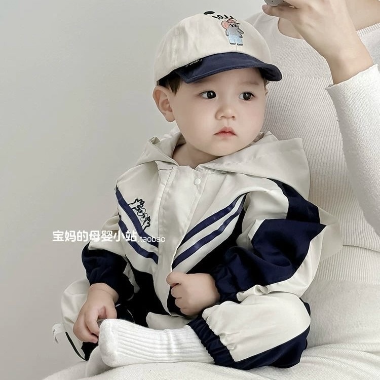 K79. WHITE BABY JUMPSUIT