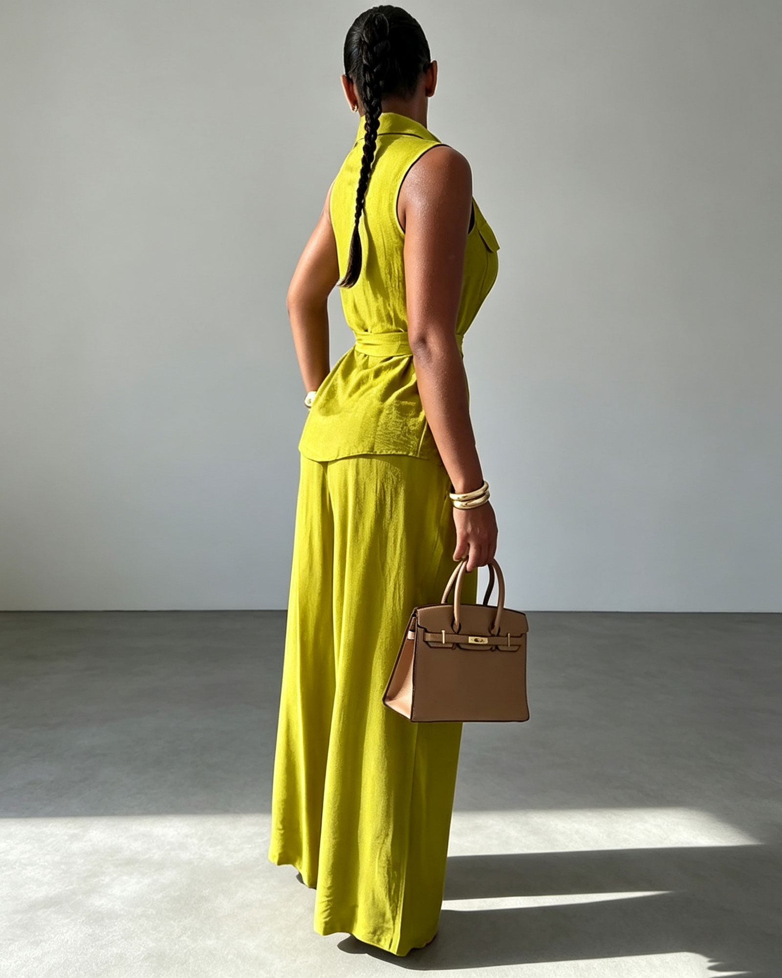 Sleeveless Button Front Top With A Collarless Stand-Up Neck And High-Waisted Wide-Leg Trousers Set