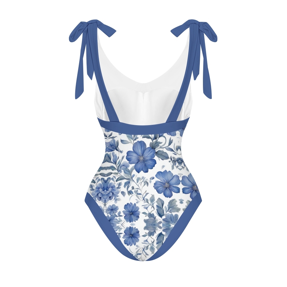 Women’s Blue Floral Swimsuit & Wrap Skirt Set with Deep V Neck and Bow Straps