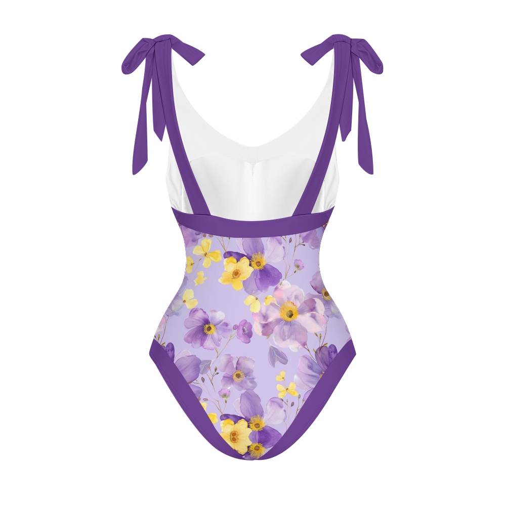 Women’s Purple Floral Swimsuit & Wrap Skirt Set with Bow Straps and V-Neckline