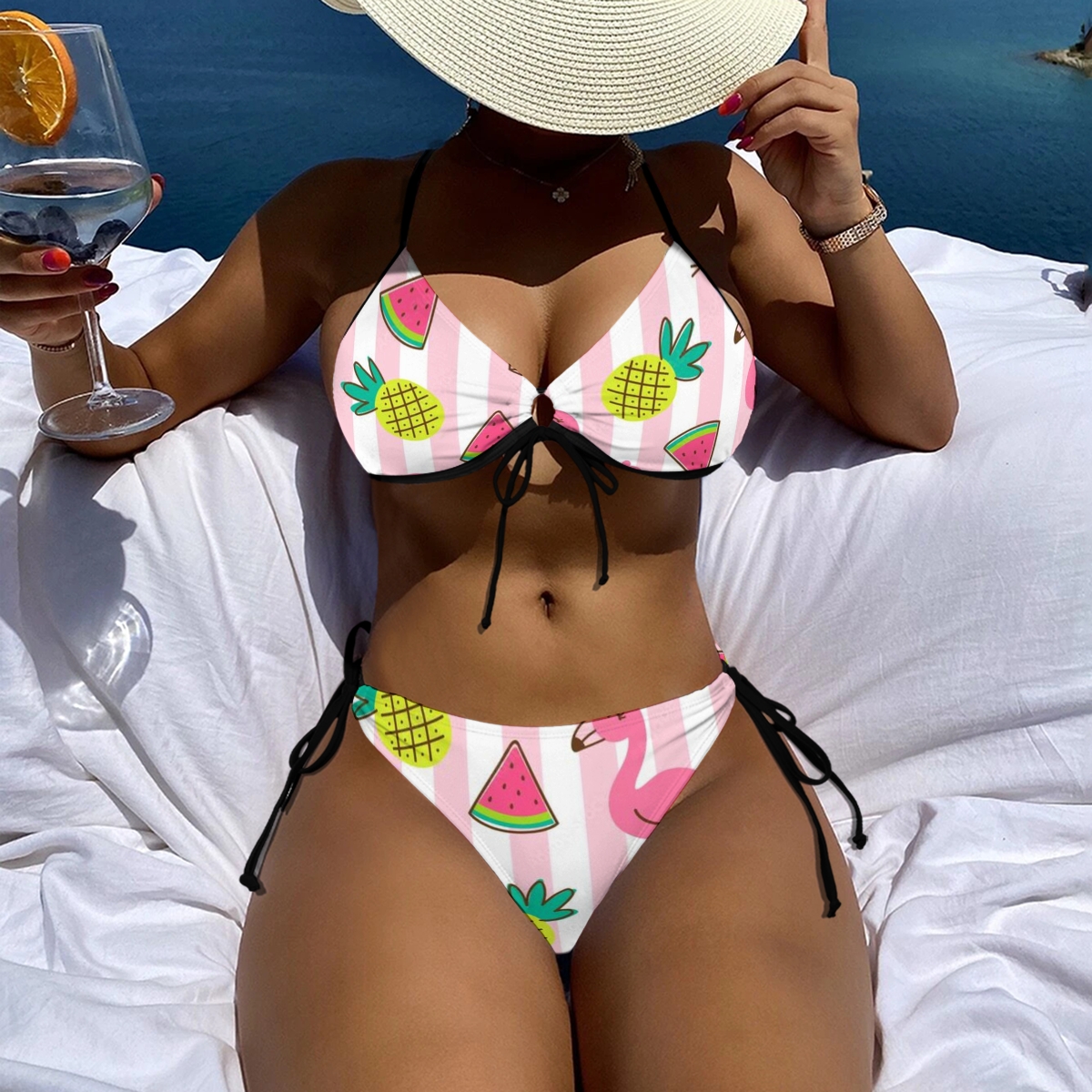 Playful Two-Piece Swimsuit with Tropical Graphics and Adjustable Tie Closures